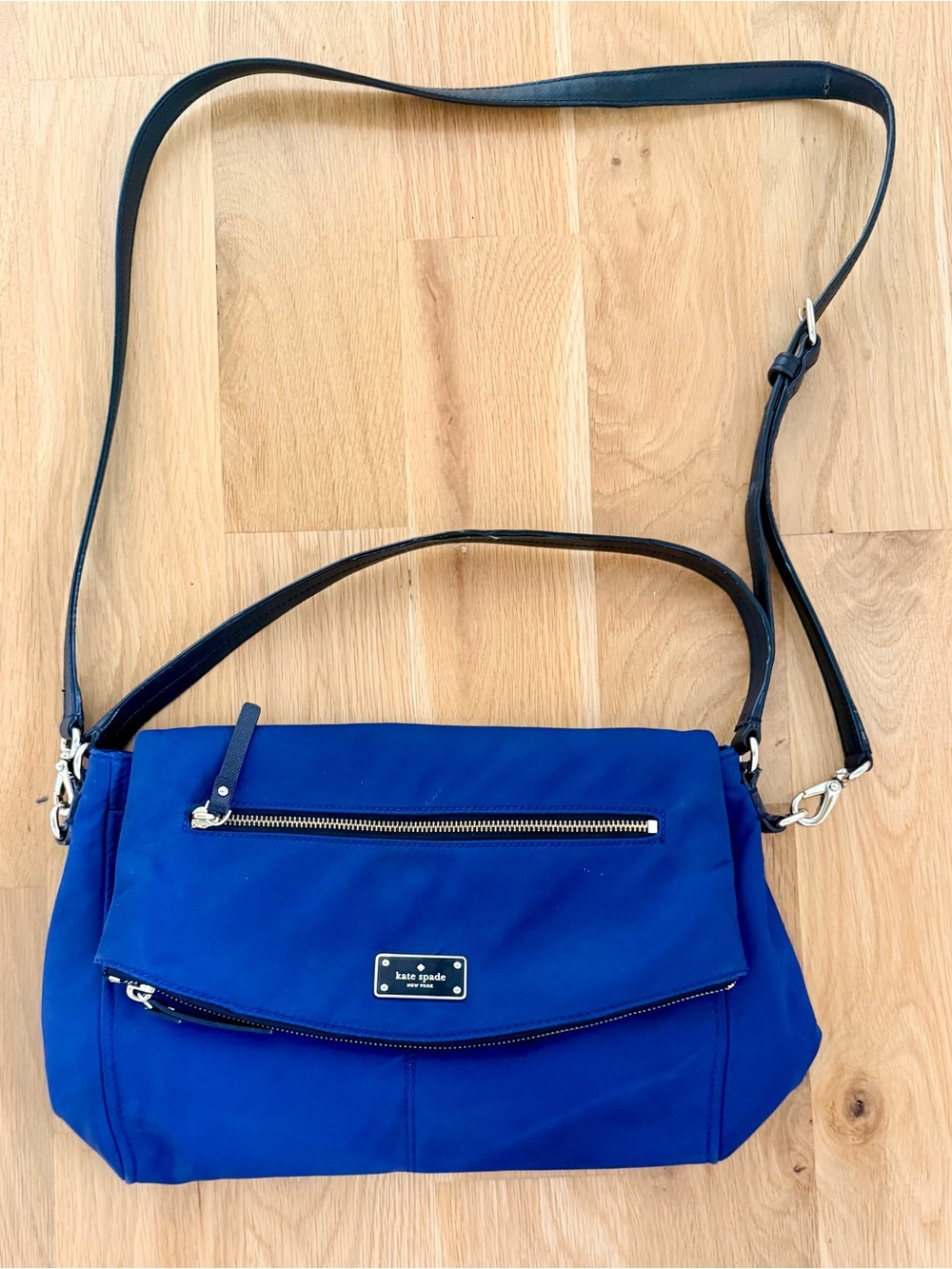 kate spade cobalt blue nylon crossbody with black strap